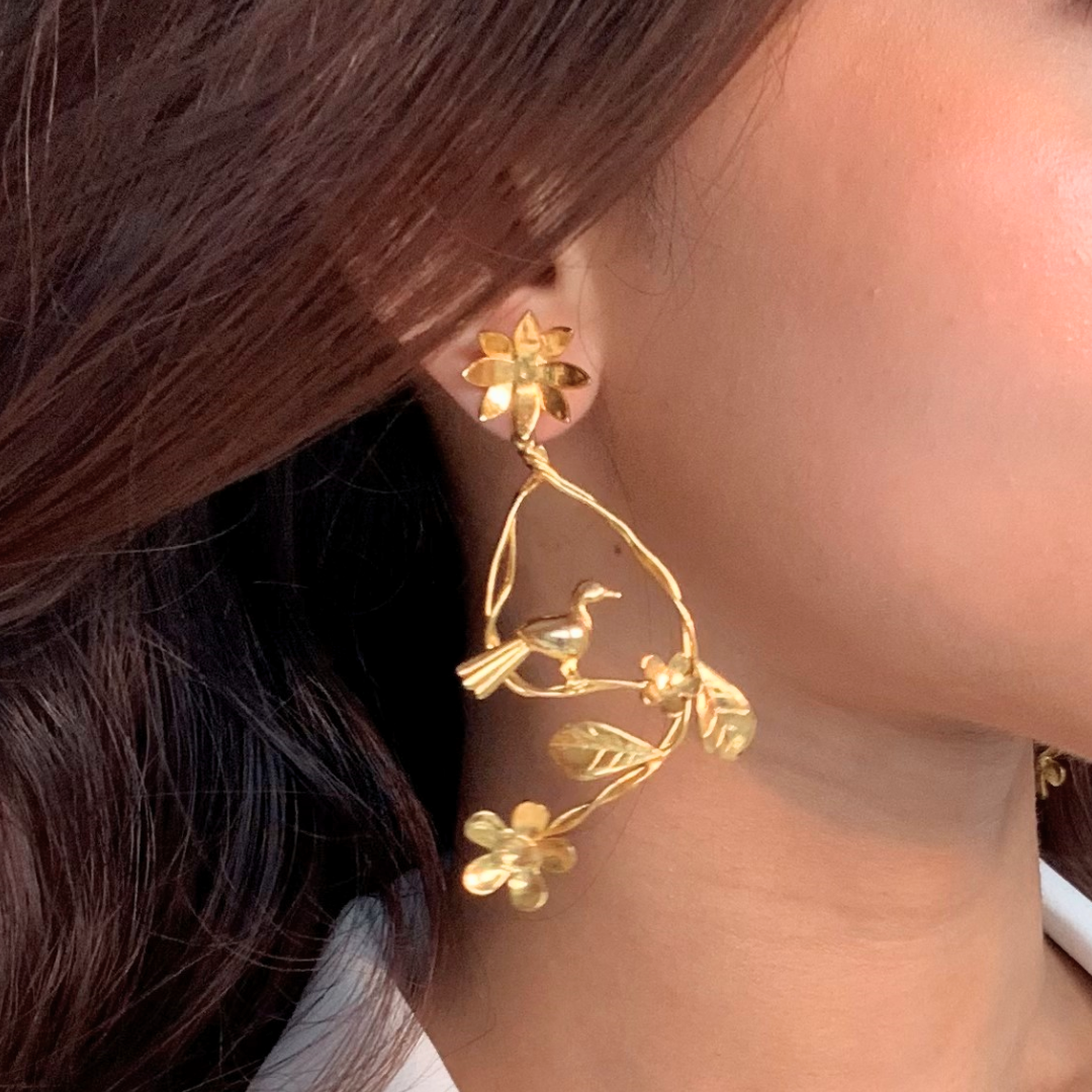 Resting Bird earrings with floral branches and perched bird, crafted in brass with 18K rhodium gold plating