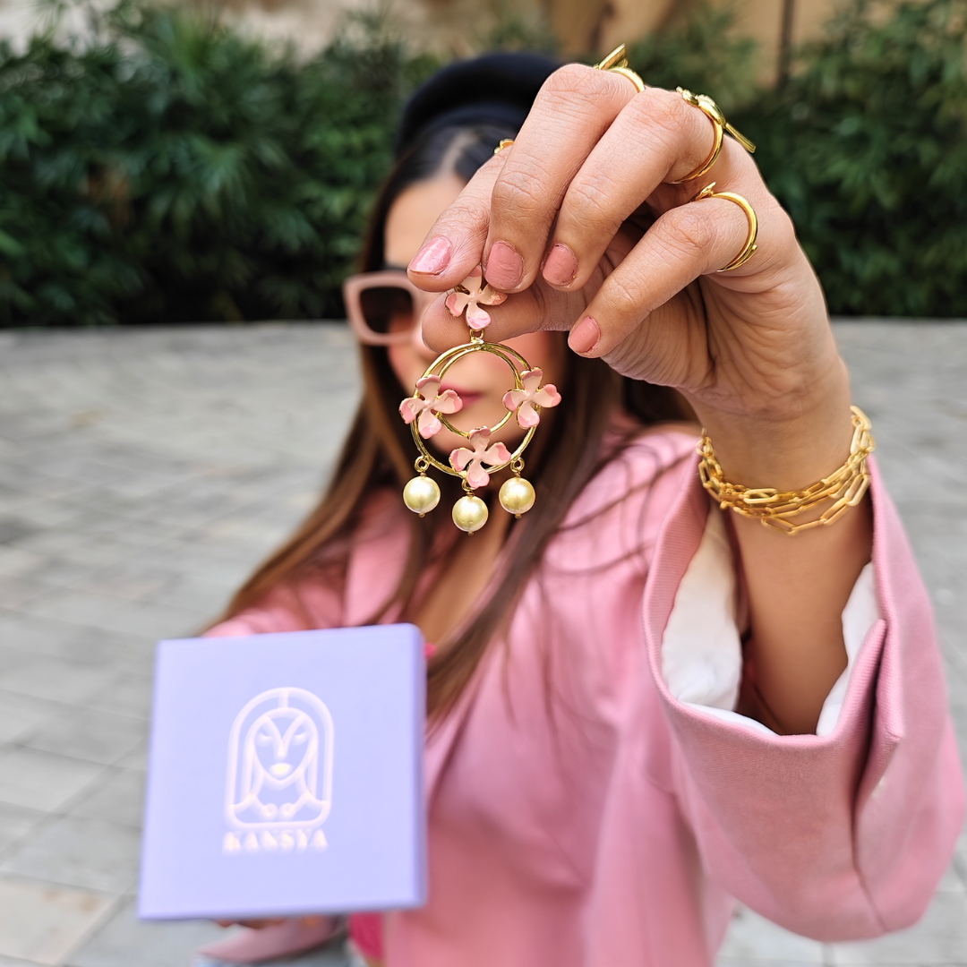 Handcrafted brass hoop earrings with pink enamel flowers and pearl drops