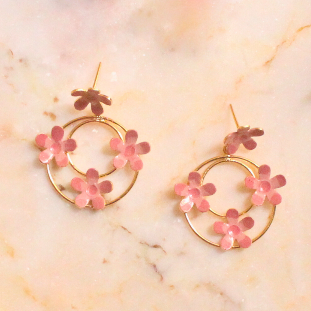 Pair of Pink Enamel Dangler Earrings with blush pink hand-enameled floral motifs on dual gold-plated brass hoops