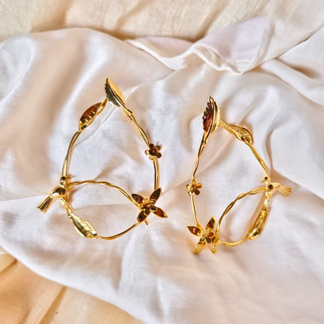 Gold Plated Earrings Featuring Intricate Floral, Leaf, and Bird Motifs