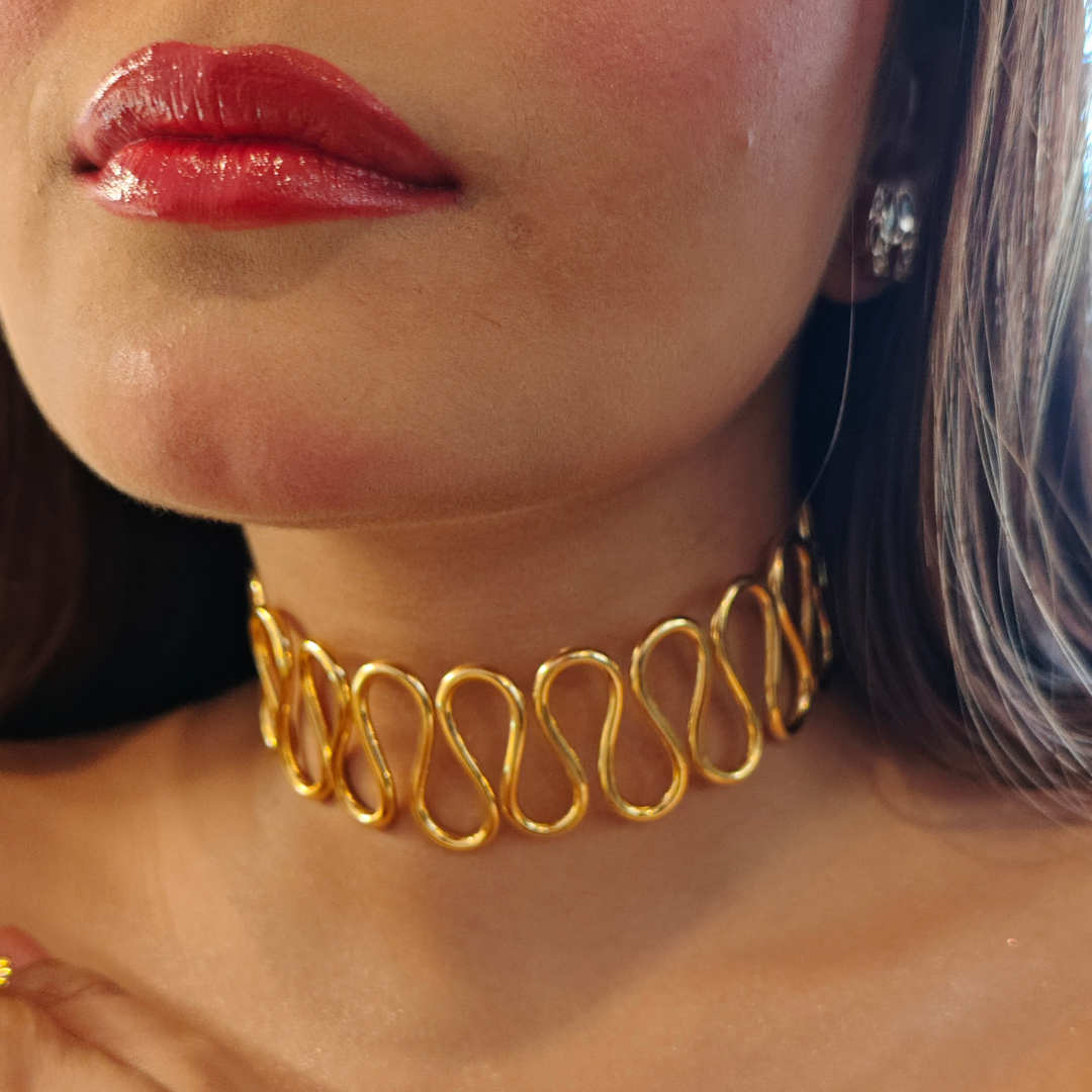 Gold-plated Spiral Cuff Necklace crafted from brass, featuring a continuous wave-like design