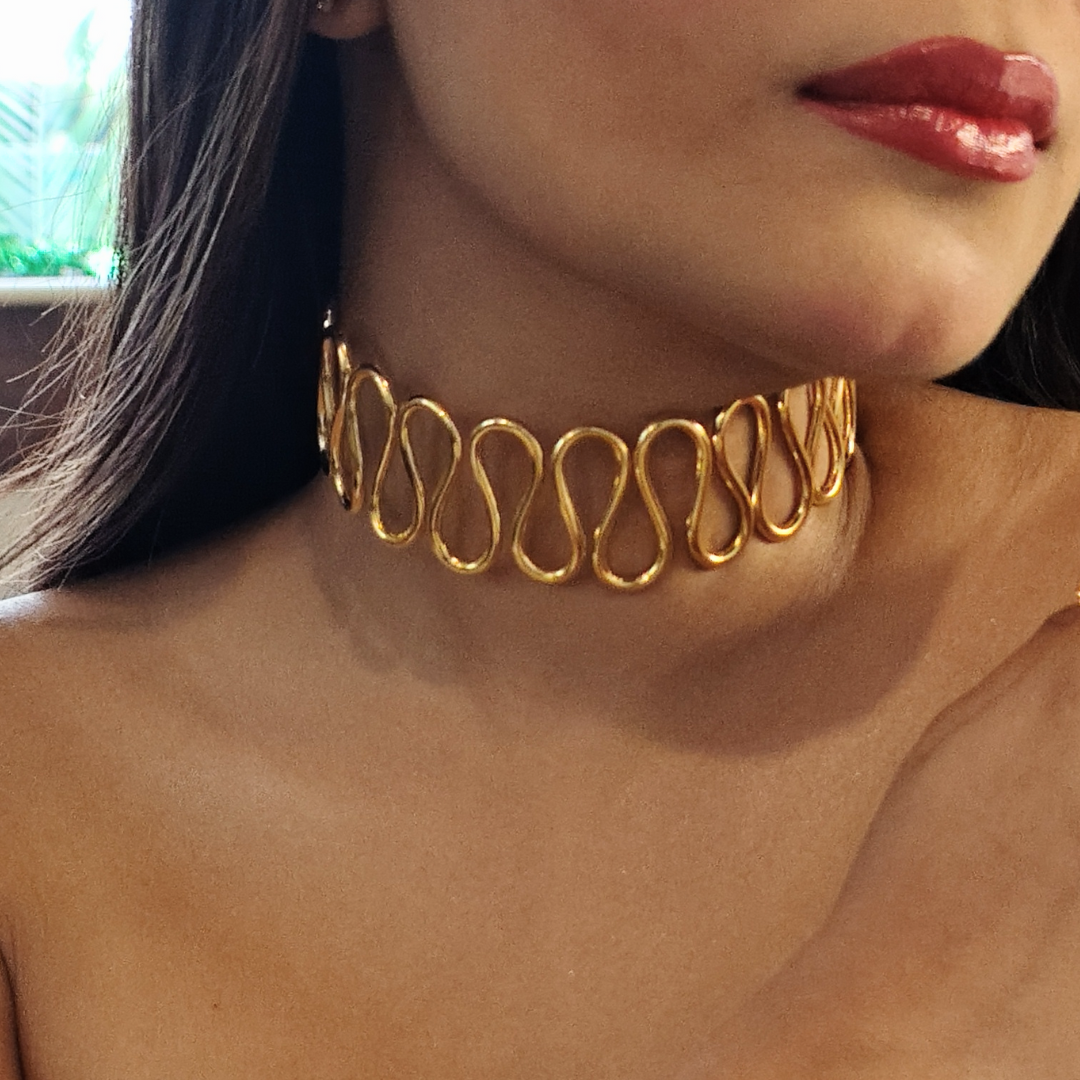 Gold-plated Spiral Cuff Necklace crafted from brass, featuring a continuous wave-like design