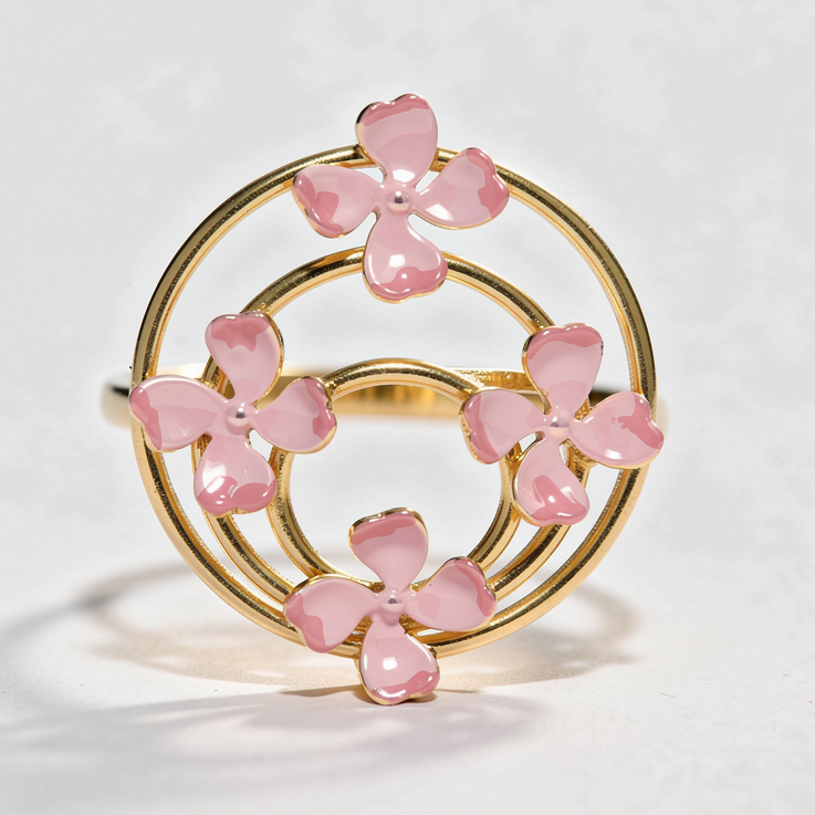 Gold plated ring with pink floral enamel detailing