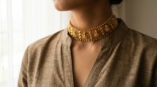 Indian woman wearing a bold gold choker necklace with a kurta – KANSYA Jewellery