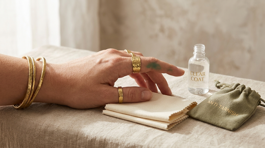 Close-up of brass jewelry leaving a green stain on skin with prevention tips