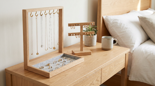 Minimalist wooden jewellery organiser with necklaces on hooks and rings in a tray – KANSYA Jewellery