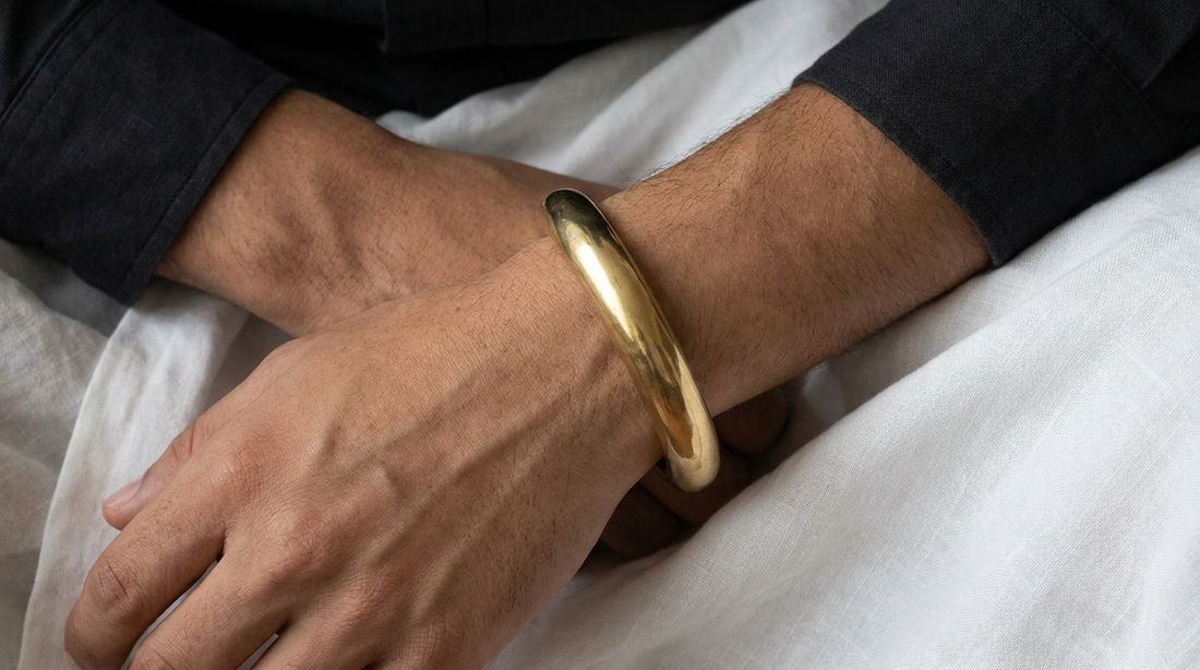 what is a kada India - gold brass kada bracelet on wrist