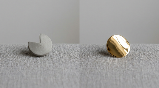 matte vs polished jewellery finish - cement and gold plated earrings on grey linen