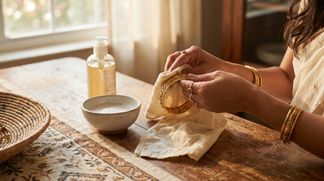Woman cleaning gold-plated brass bracelet with soft cloth at home – KANSYA Jewellery
