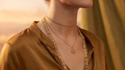 Indian woman wearing three layered gold necklaces of different lengths – KANSYA Jewellery