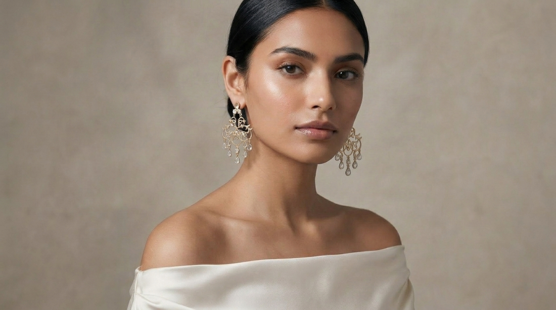 Woman wearing chandelier earrings styled with traditional Indian ethnic wear