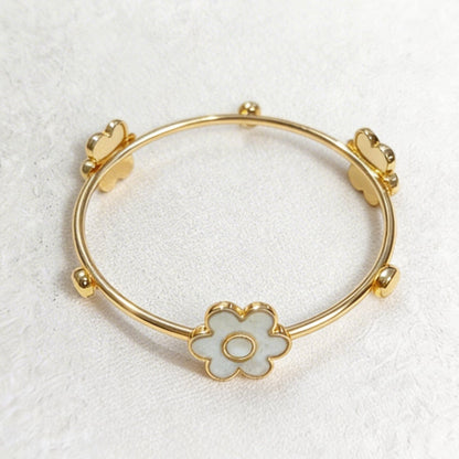 bangle with cement filled flower shapes