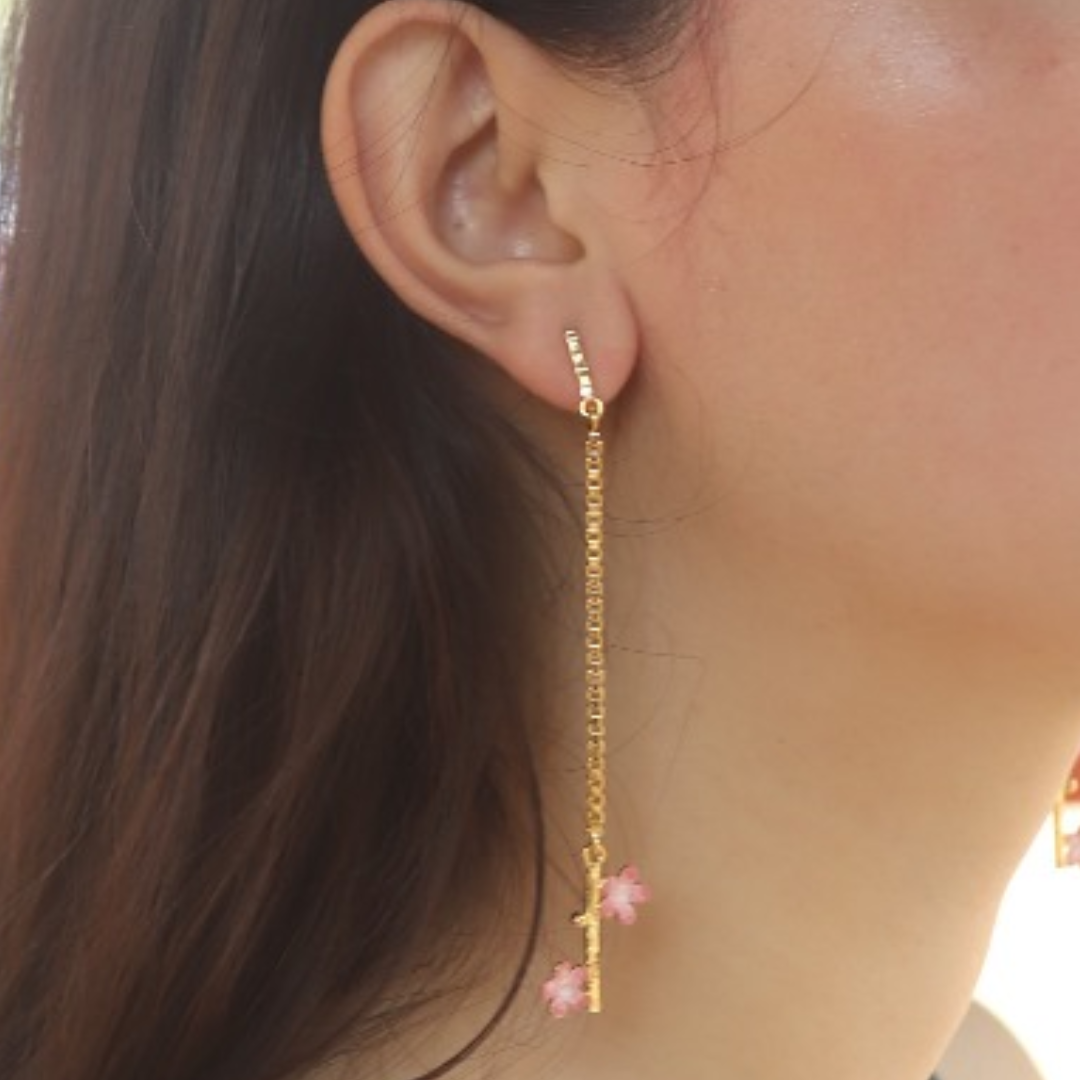 Brass pink flower chain dangler earrings with pink enamel and 18K rhodium gold plating