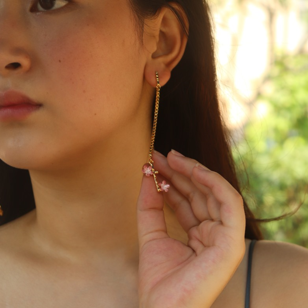 Brass pink flower chain dangler earrings with pink enamel and 18K rhodium gold plating 