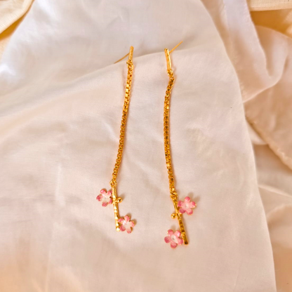 Brass pink flower chain dangler earrings with pink enamel and 18K rhodium gold plating