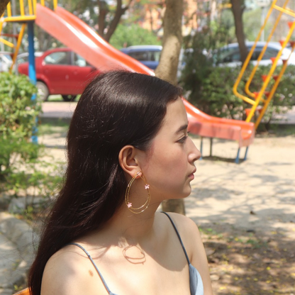 Brass drop shape pink flower earrings with pink enamel and 18K rhodium gold plating