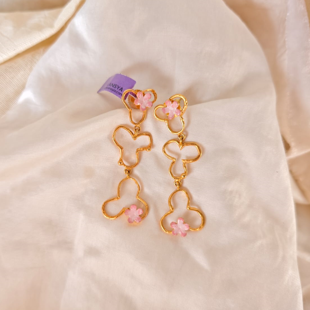Brass Pink Blossom Trio earrings with pink enamel flowers and 18K rhodium gold plating
