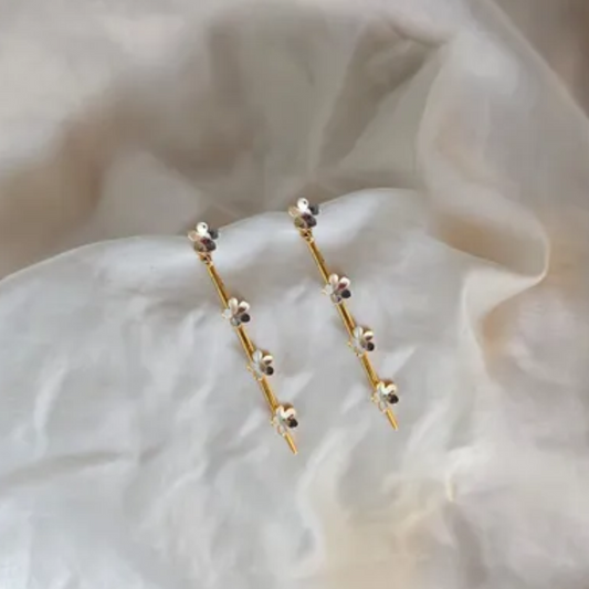 Baby’s Breath twig earrings, made of brass with 18K rhodium gold and silver plating