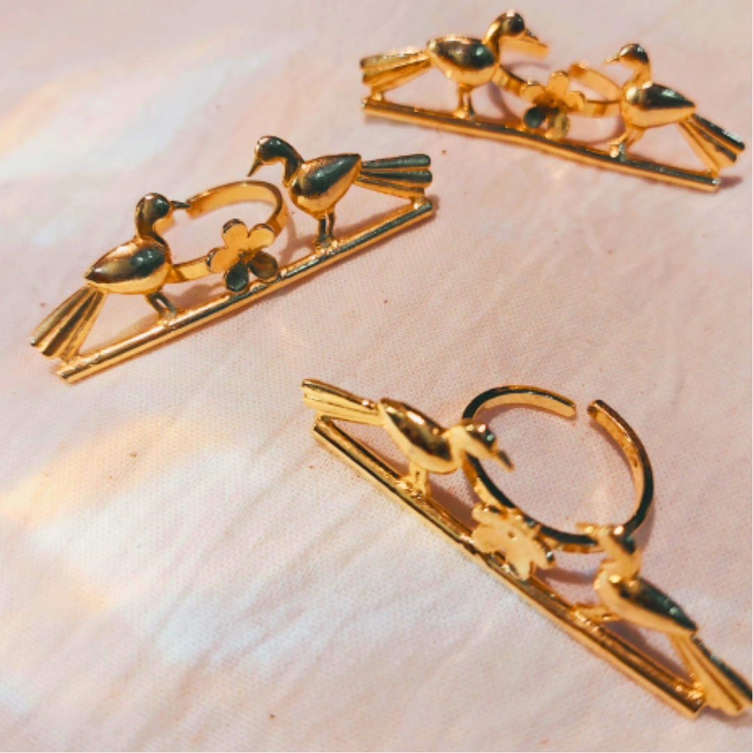 Love Birds ring with sculpted birds and floral design, crafted from brass with 18K rhodium gold