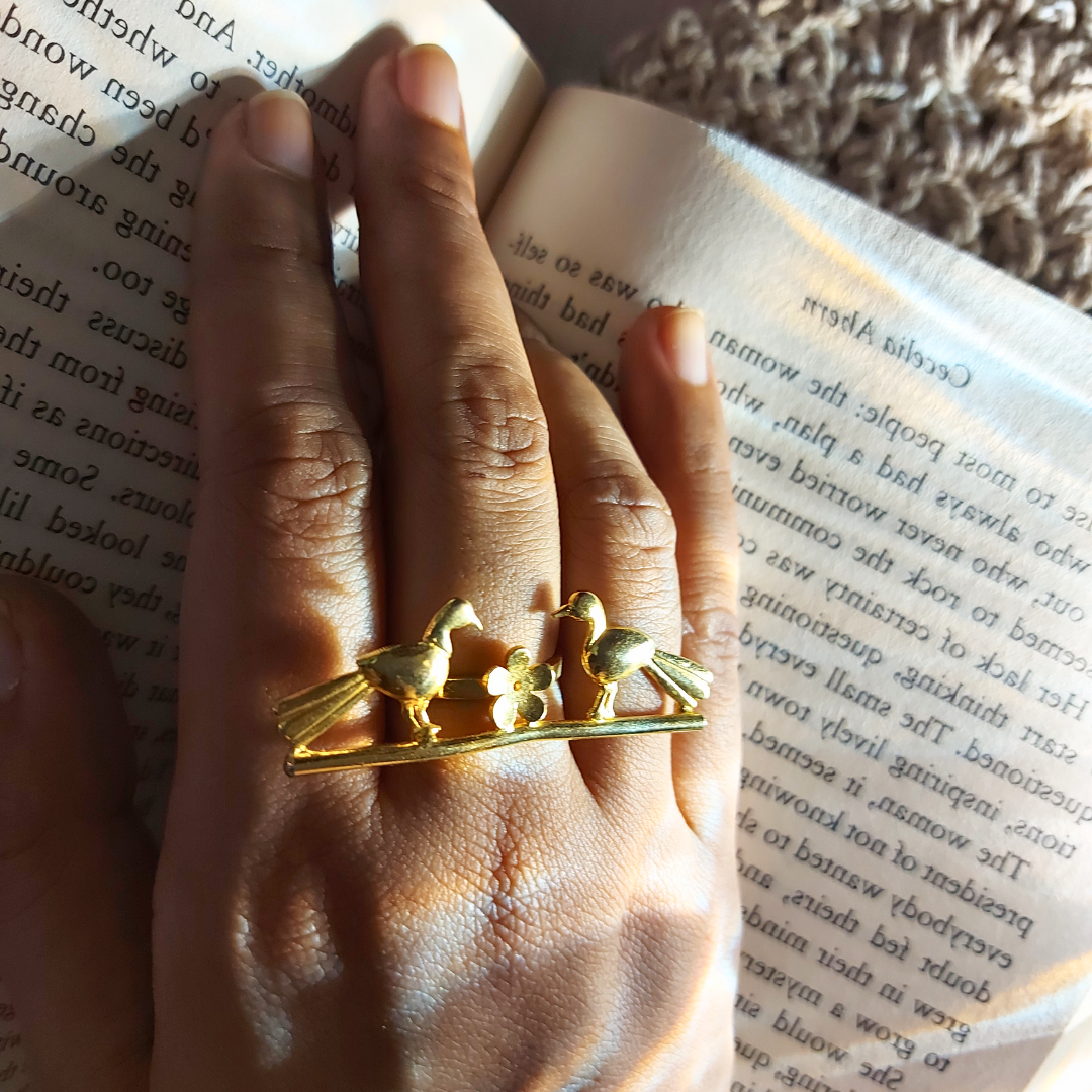 Love Birds ring with sculpted birds and floral design, crafted from brass with 18K rhodium gold