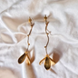Hanging flower earrings with matte-gold petals and flowing vine stems, made from brass and 18K rhodium gold plating