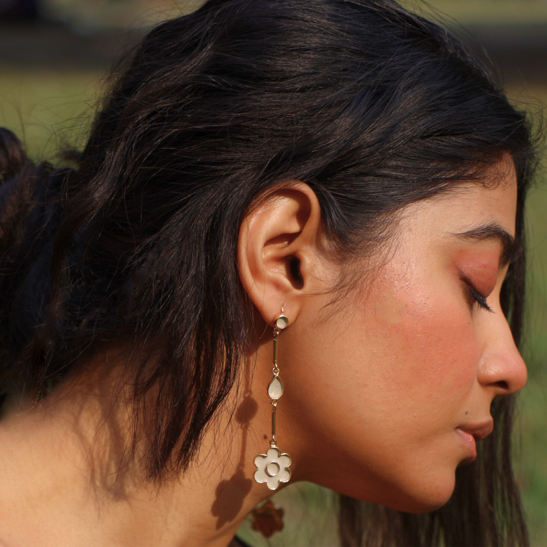 Handcrafted drop flower earrings in cement and brass with 18K rhodium gold plating