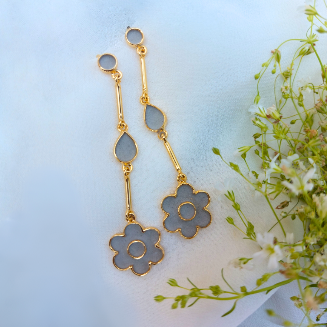 Handcrafted drop flower earrings in cement and brass with 18K rhodium gold plating