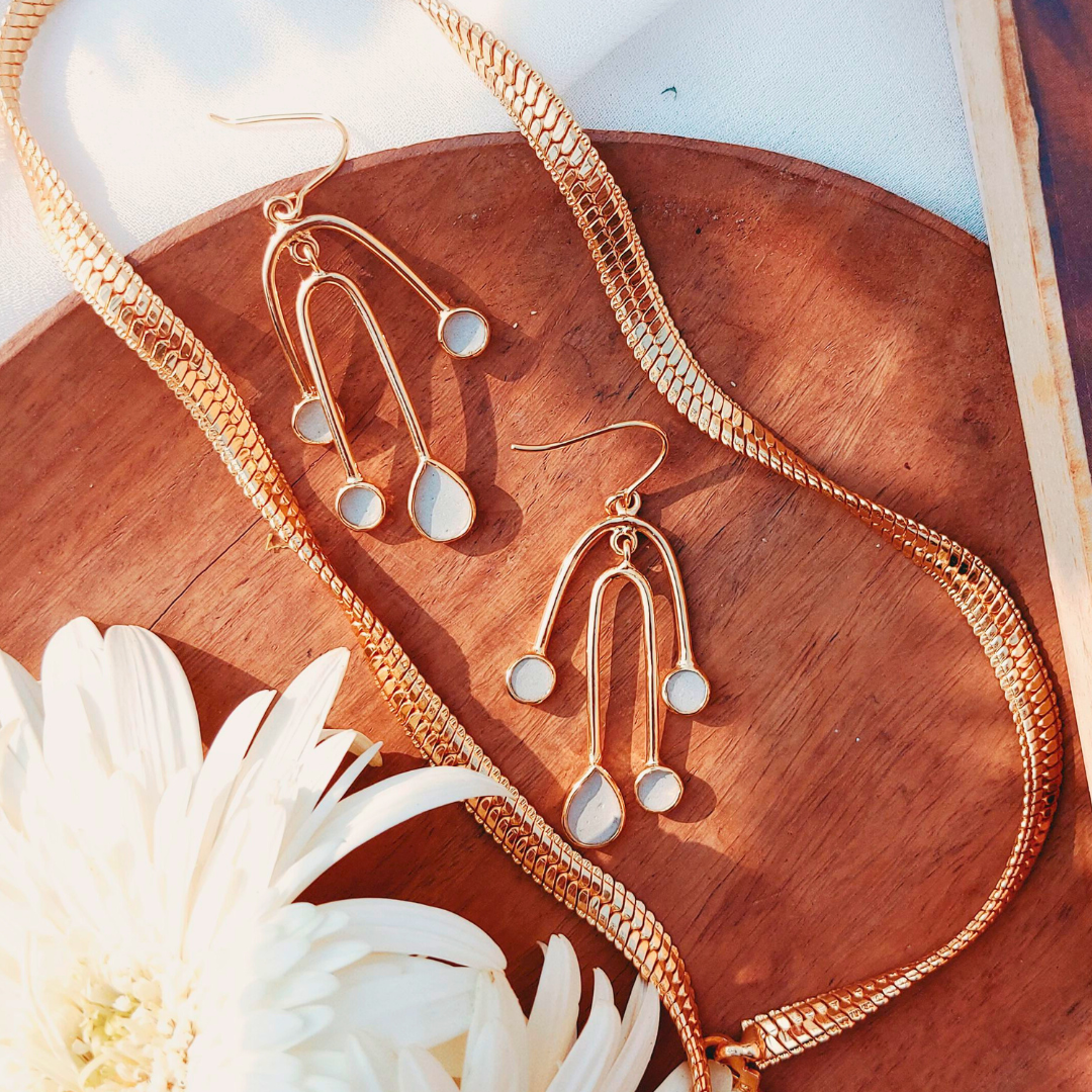 Handcrafted playful cement and brass earrings with 18K rhodium gold plating