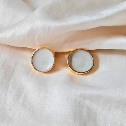 Handcrafted cement and brass round studs with 18K rhodium gold finish