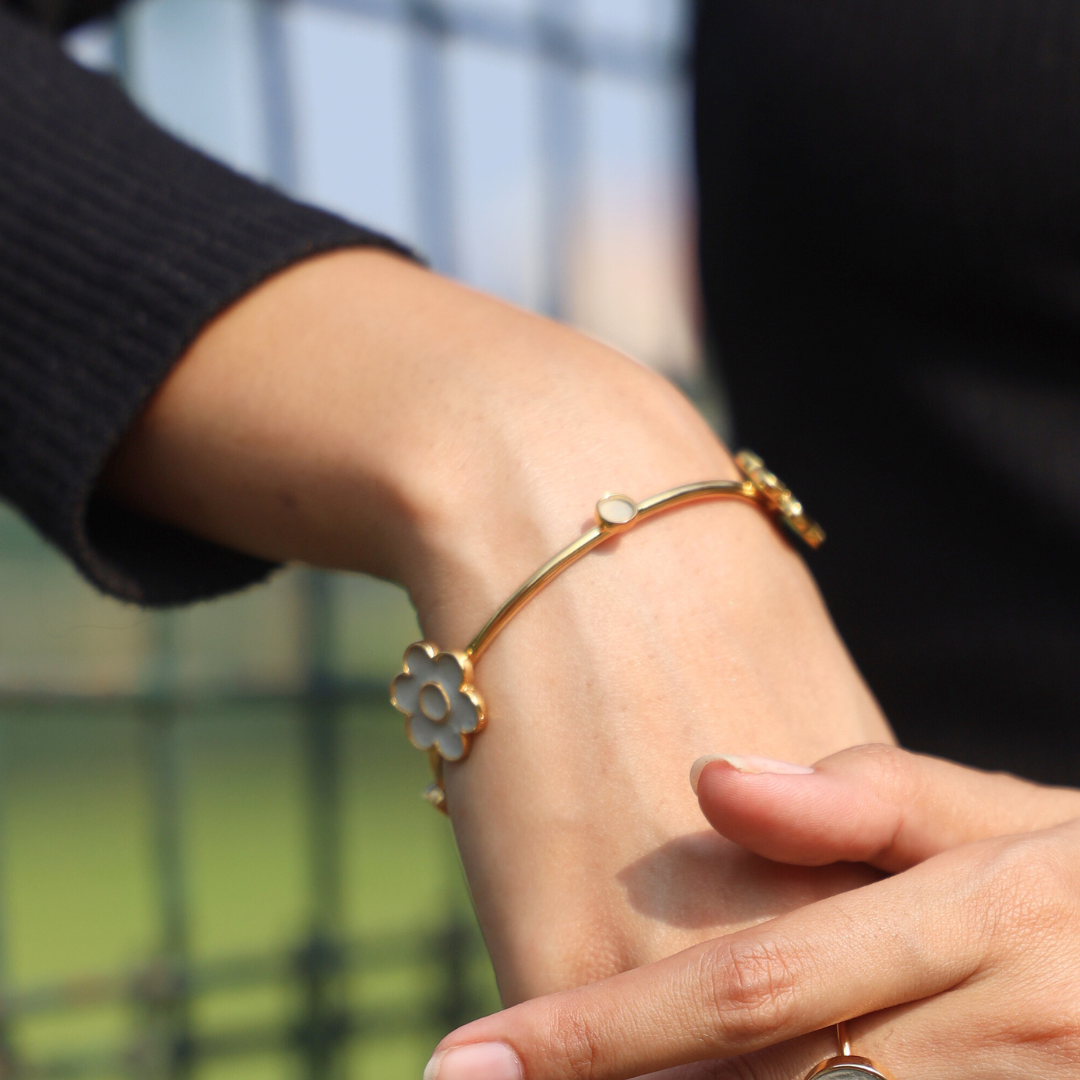 Handcrafted floral cement and brass bangle with 18K rhodium gold plating