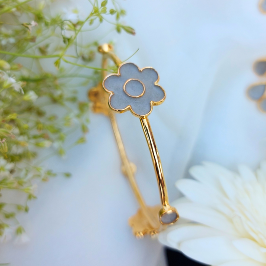 Handcrafted floral cement and brass bangle with 18K rhodium gold plating