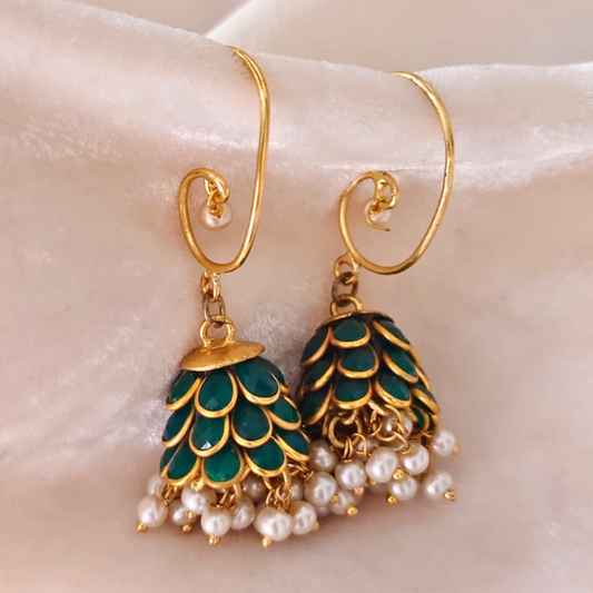 Green acrylic jhumki earrings with lotus petal design, pearl drops, and 18K rhodium gold finish