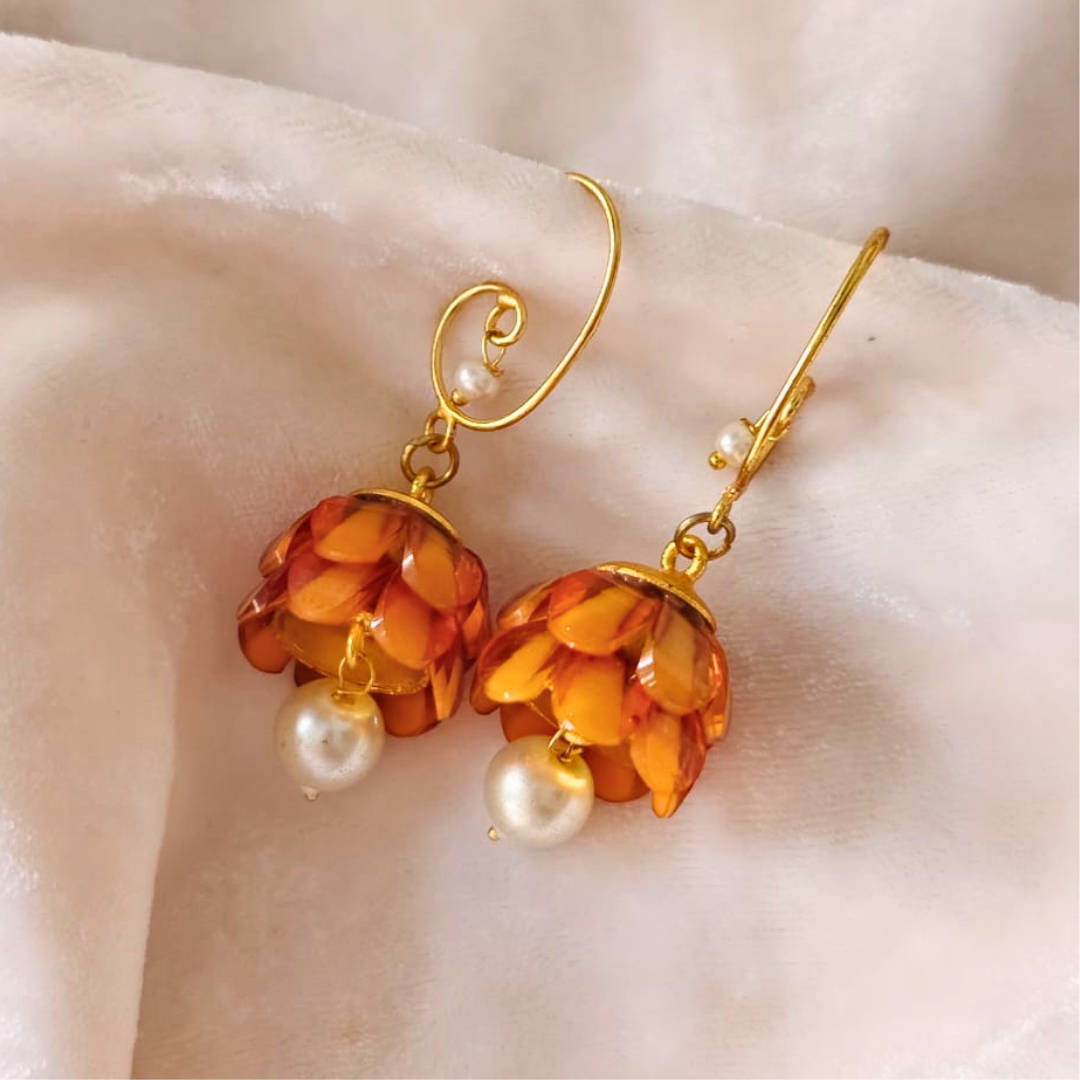 Lightweight orange jhumki earrings with layered acrylic petal dome and single pearl drop