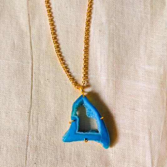 Blue druzy agate pendant with natural geode center on gold-toned brass chain