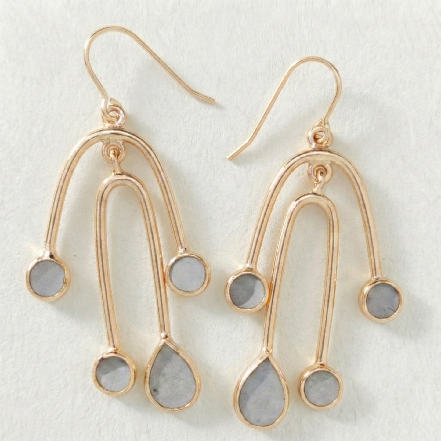 Gold earrings with cement filled inside 