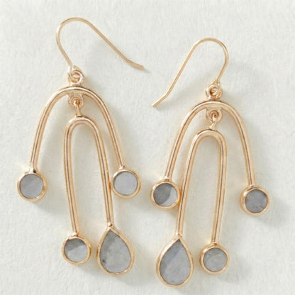 Gold earrings with cement filled inside 