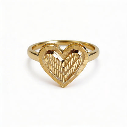 Gold heart-shaped ring on a white background