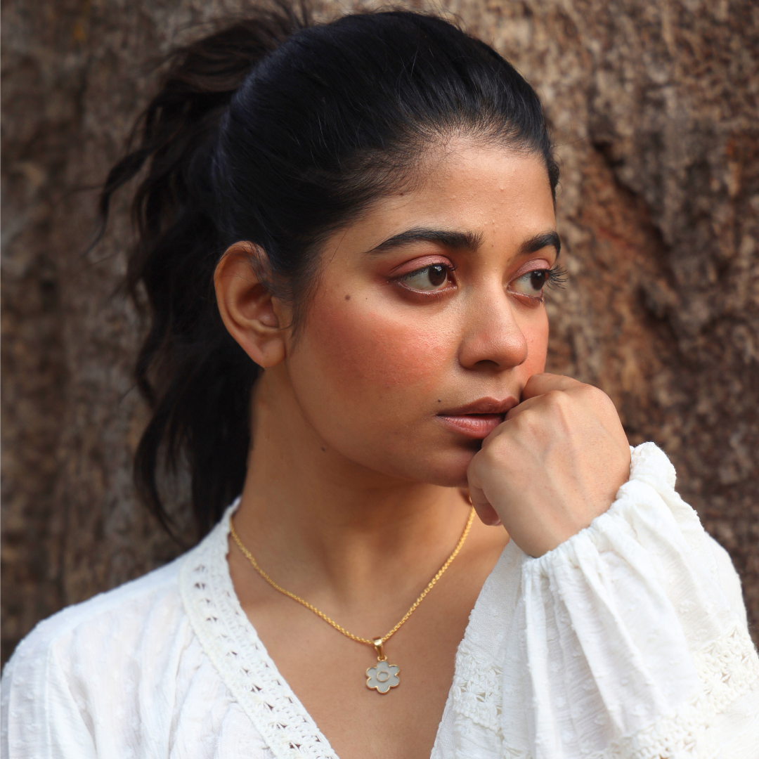 model_wearing_cement_filled_floral_design_pendant
