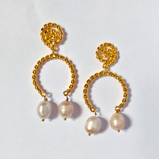 A pair of elegant gold-plated earrings featuring a spiral stud leading into a twisted open hoop, each adorned with two white natural pearls hanging at the bottom