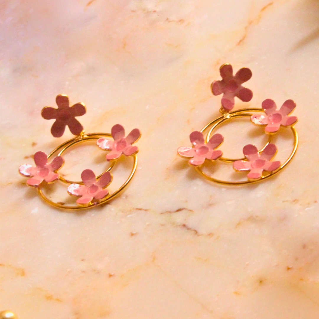 Pair of Pink Enamel Dangler Earrings with blush pink hand-enameled floral motifs on dual gold-plated brass hoops