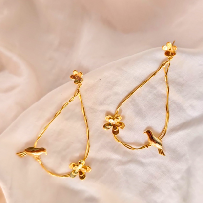 Gold Plated Teardrop Earrings with Twisted Wire Design, Adorned with Small Floral Accents and Perched Bird Motifs