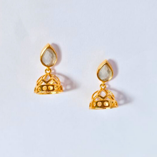A pair of gold-plated jhumka earrings with pear-shaped faux kundan studs and intricately designed dome-shaped danglers, handcrafted in brass 
