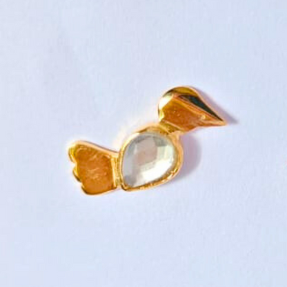 A pair of gold-plated bird-shaped stud earrings with faux kundan stones forming the body, handcrafted in brass 