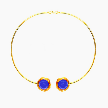 Handcrafted Torc-style necklace featuring two faceted blue onyx stones wrapped in golden wire on an open choker brass band with 18K rhodium gold plating