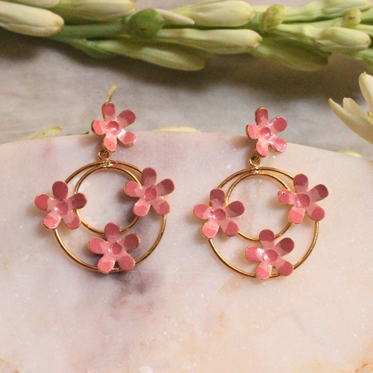 Pair of Pink Enamel Dangler Earrings with blush pink hand-enameled floral motifs on dual gold-plated brass hoops