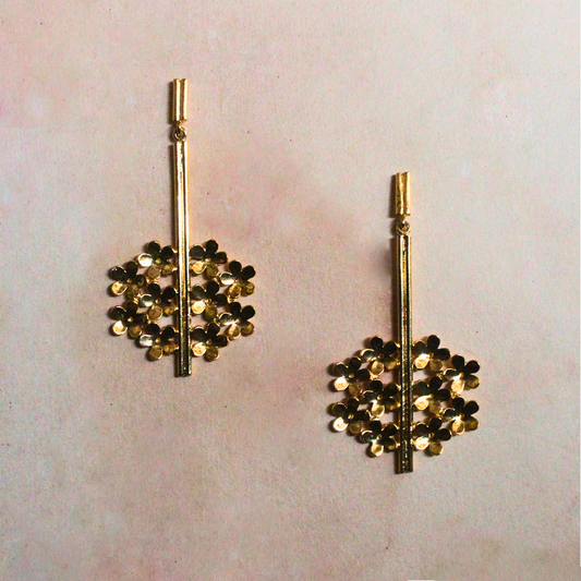 Handcrafted brass earrings finished with radiant 18K rhodium gold plating, featuring vertical stem-like bars and clustered golden petal blooms