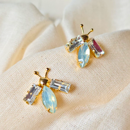 White and opal gold bug ear studs with brass, faux opal navette center and 18K rhodium gold finish