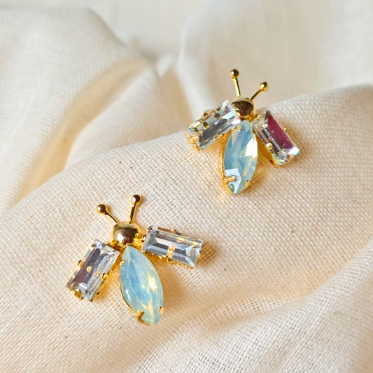 White and opal gold bug ear studs with brass, faux opal navette center and 18K rhodium gold finish