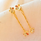 Brass floral earrings with 18K rhodium gold plating, twin blossoms and gentle sway