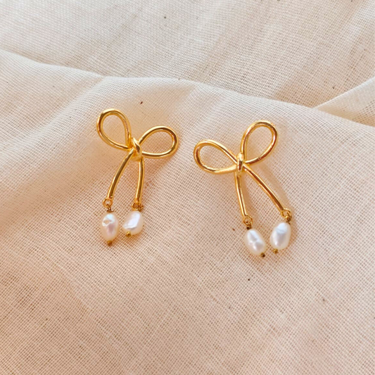 18K rhodium gold-plated bow earrings with dangling twin baroque pearls